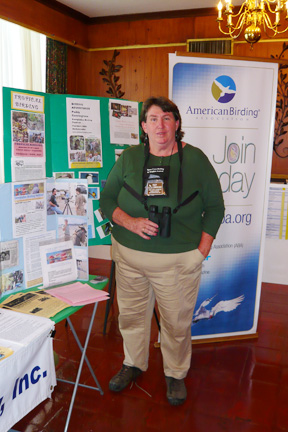Paddy Cunningham at an American Birding Association booth.